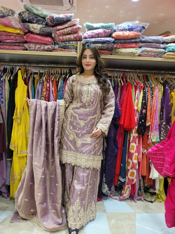 Sharara Suit with all over zari work, moti work and handwork on the shirt and Sharara with booties all over the dupatta