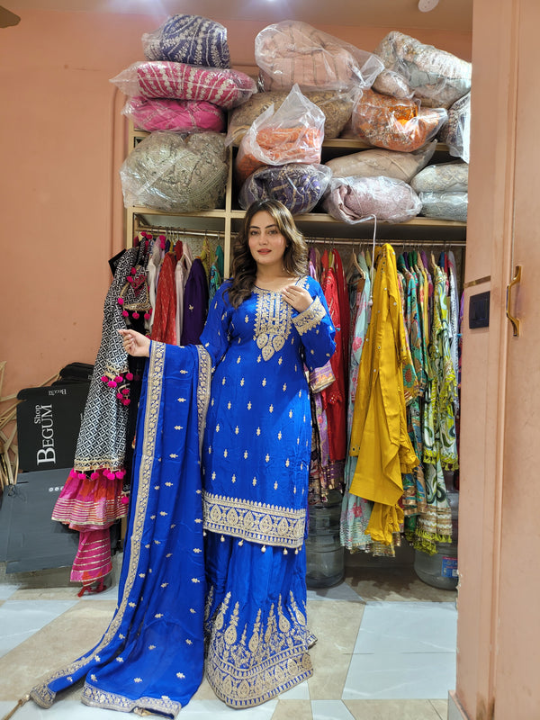 Sharara Suit with all over weaving, moti work and handwork on the shirt and sharara with booties all over the dupatta