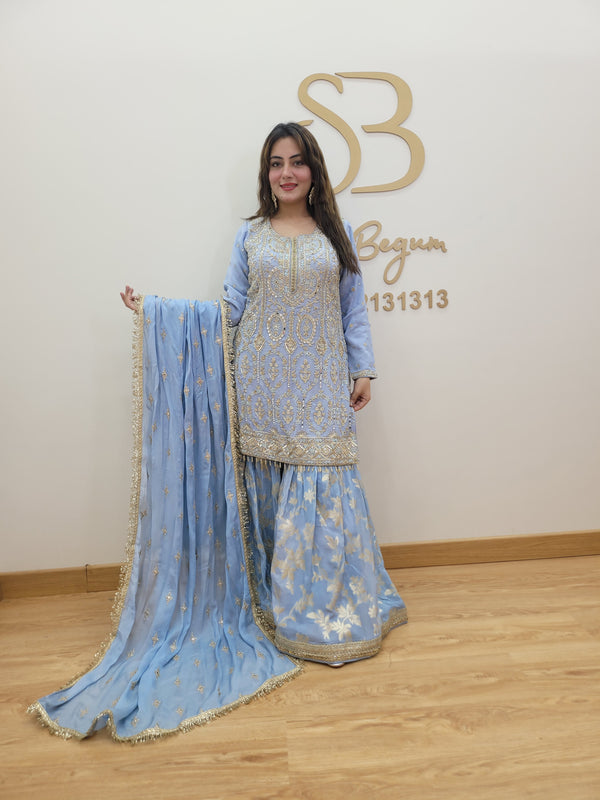 Sharara suit with all over zardozi work, dabka work, moti work, mirror work and handwork on the shirt with Sharara and booties all over the dupatta