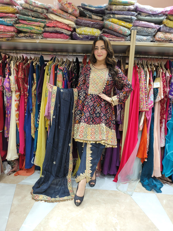 Suit with all over digital print and zari work along with tulip pants
