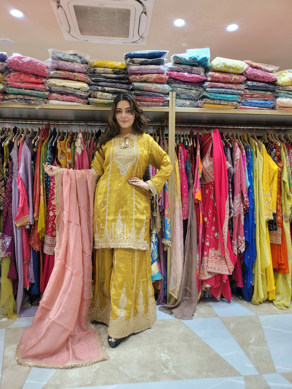 Sharara suit with multi work on shirt and sharara with contrast dupatta