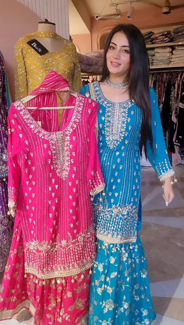 Suit with all over dabka and zardozi work on the shirt and Gharara with dupatta all over the work