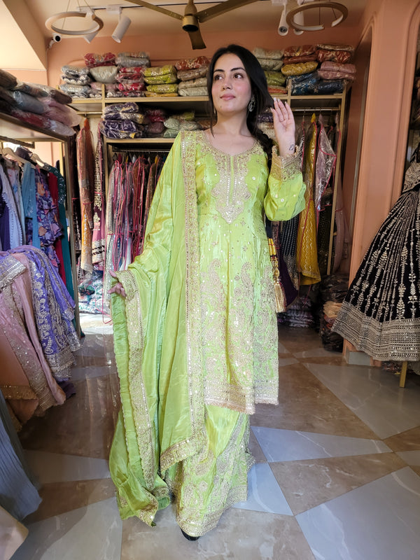 Sharara suit with all over zari, mirror work and handwork on the Shirt and sharara with all sided work on beautiful dupatta