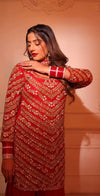 Sharara suit with all over cutdaana and moti work on shirt with Sharara and choker net dupatta